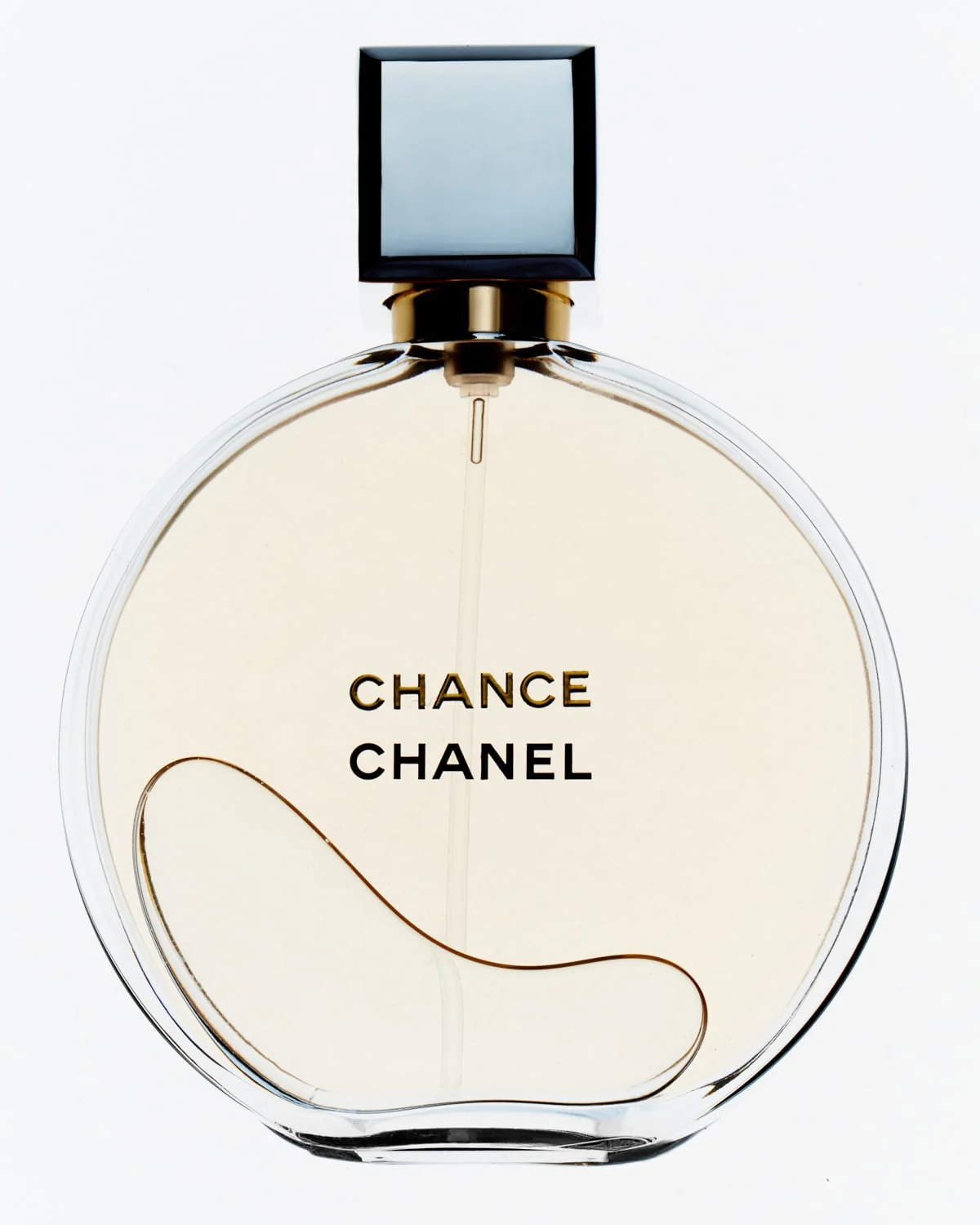 Round glass Chance perfume bottle with pale gold fragrance and a square cap on a white background, for Chanel.