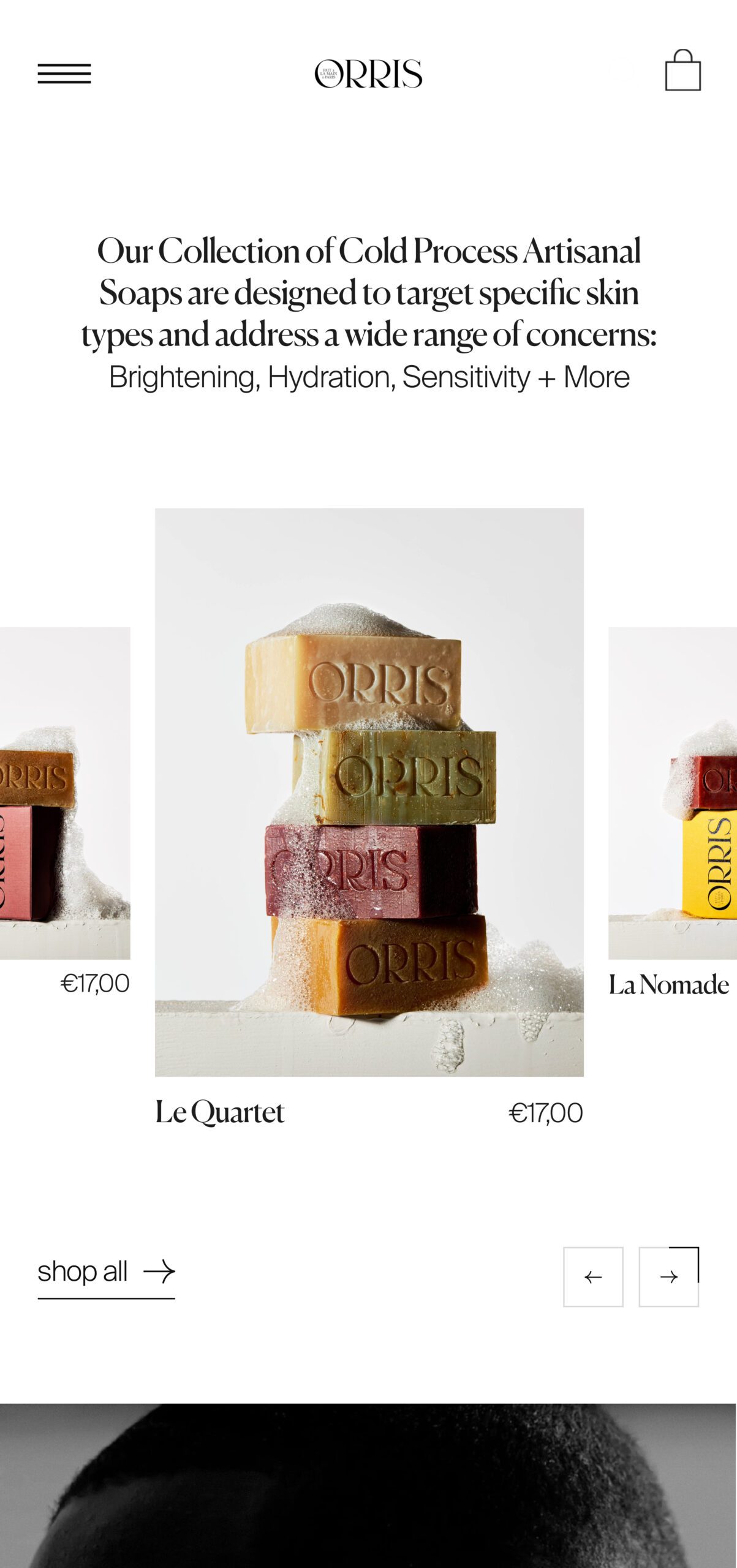 Mobile web page showing a stack of four lathered artisanal soap bars in a product carousel, for Orris.