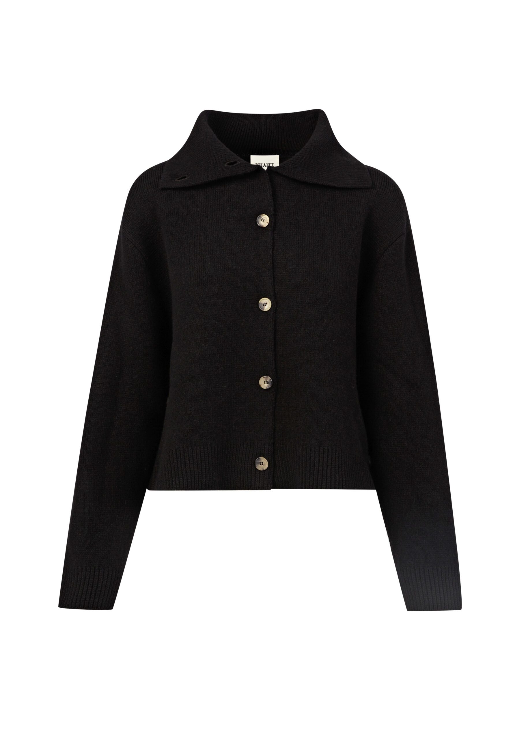 Black knit cardigan with a wide collar and tortoiseshell buttons on a white background, for Khaite.