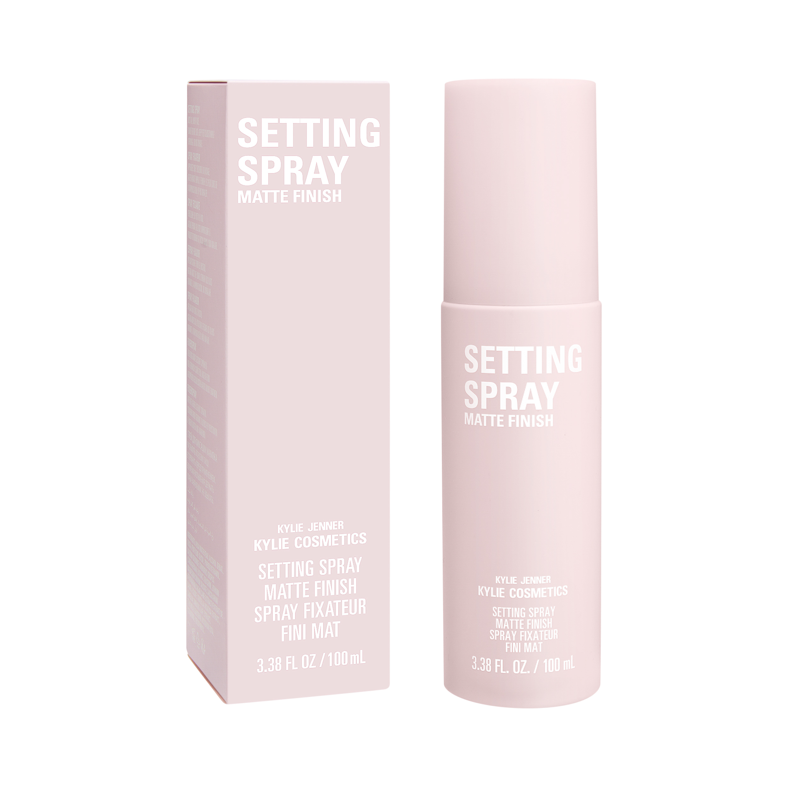 Pale pink matte finish setting spray bottle beside its matching box on a white background, for Kylie Cosmetics.