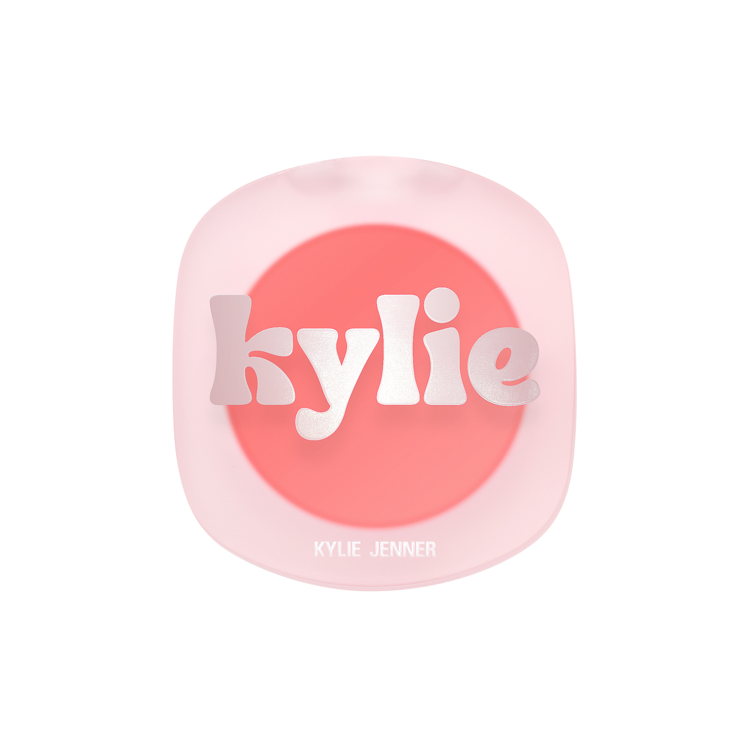 Frosted pink blush compact with a silver kylie logo over coral powder on a white background, for Kylie Cosmetics.