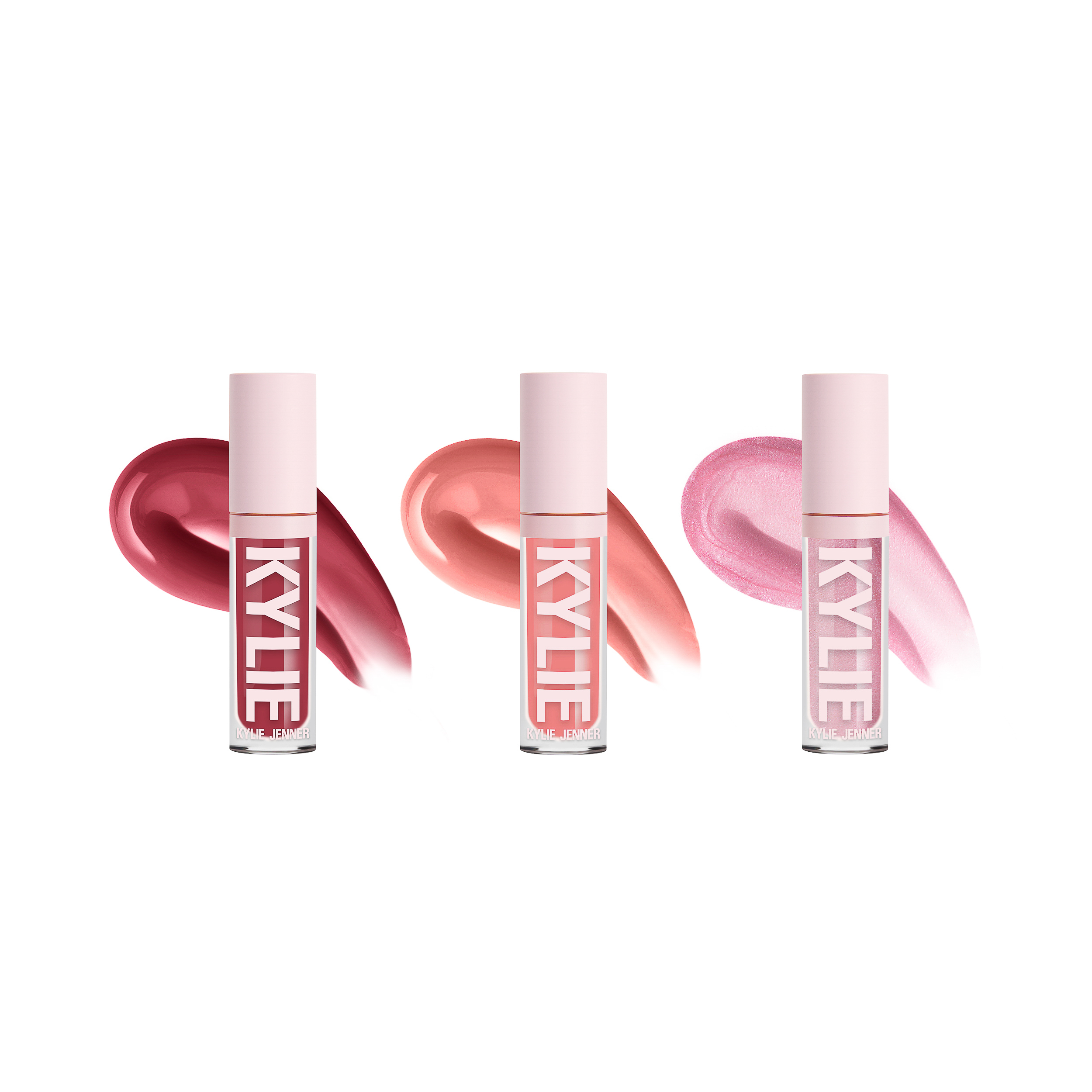 Three lip gloss tubes in berry, peach and shimmering pink with matching swatches on white, for Kylie Cosmetics.