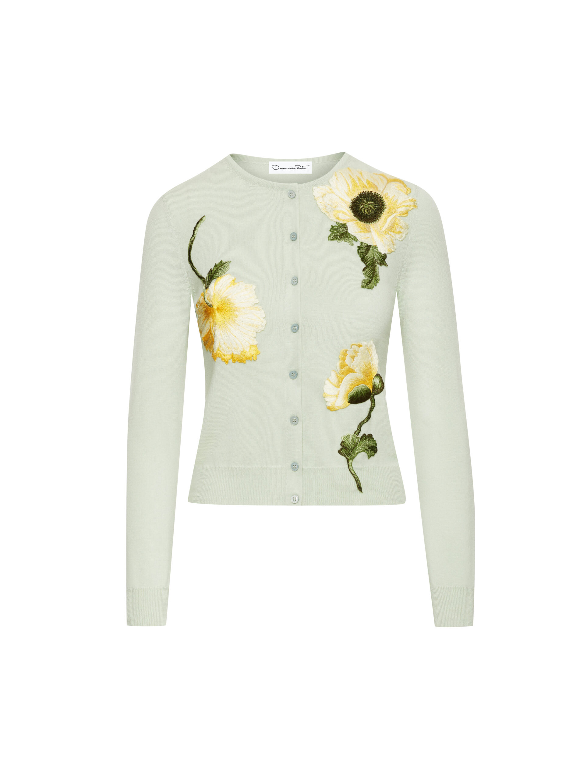 Mint green knit cardigan with embroidered yellow poppies and grey buttons on a white background, for Oscar de la Renta.
