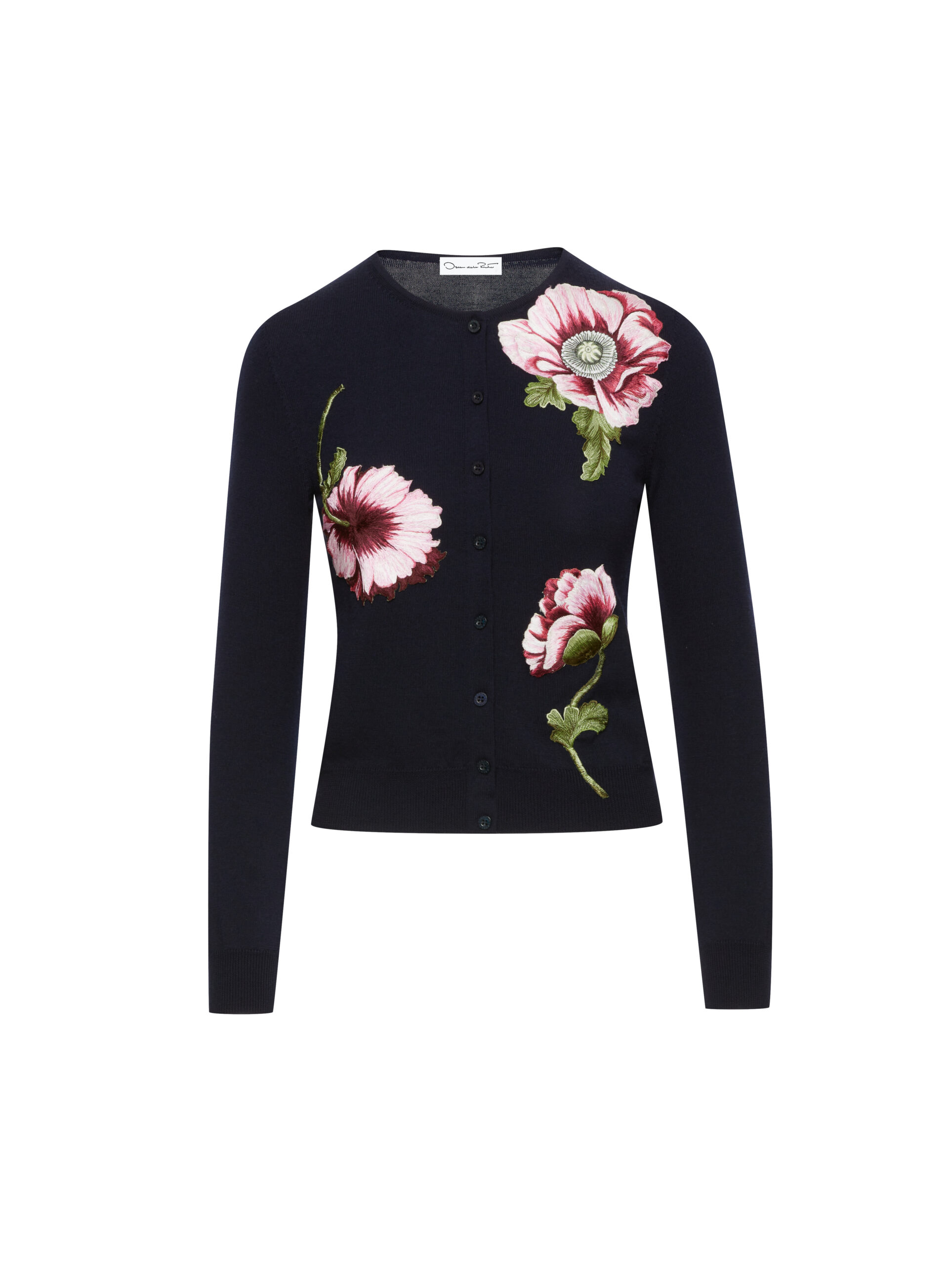 Navy knit cardigan with pink poppy embroidery and green stems, shown flat on a white background, for Oscar de la Renta.