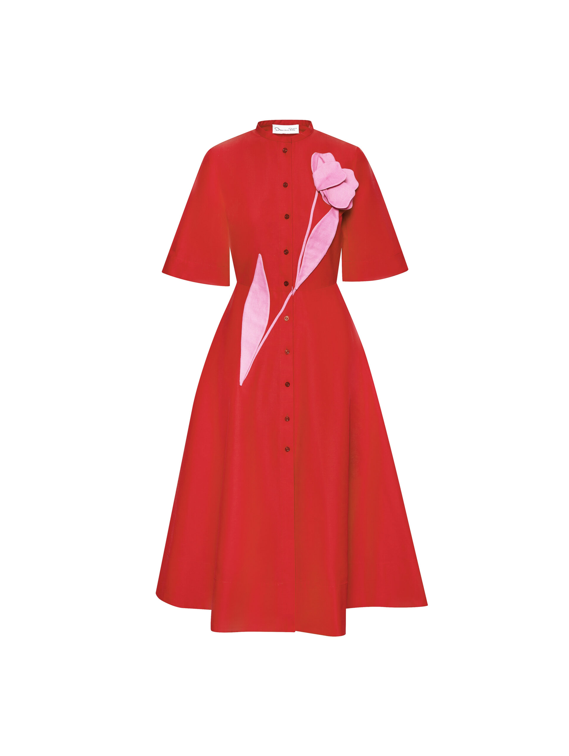 Red short-sleeved button-front midi shirtdress with a pink tulip appliqué on a white background, for Oscar de la Renta.